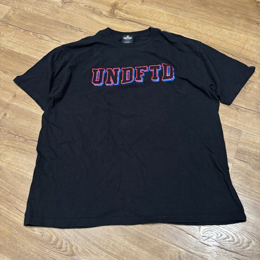 Undefeated Black Short Sleeve T-Shirt Blue and Red Logo Graphic